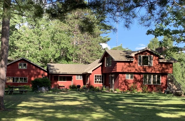 Family friendly lakefront property on large wilderness estate with sandy beach