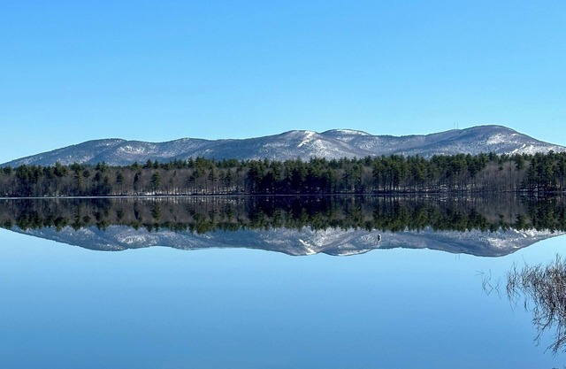 Family friendly lake front retreat with easy access to skiing and snowmobiling