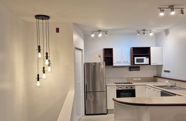 Family friendly two bedroom apartment with secure free carparking. Pool &Gym too