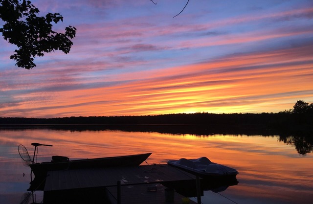 Family lakefront home with private walk-in beach and dock at Stillwater Lake
