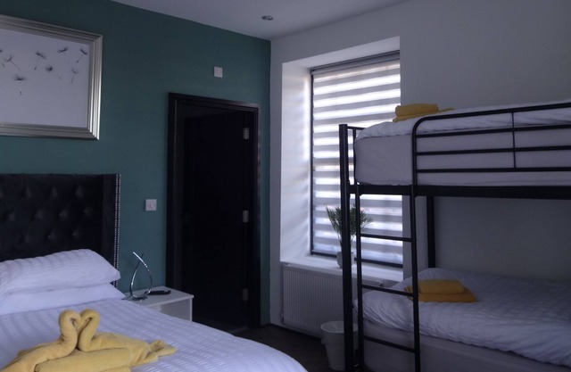 Family room in the farmhouse, sleeping 5, breakfast included in onsite bistro close to beach