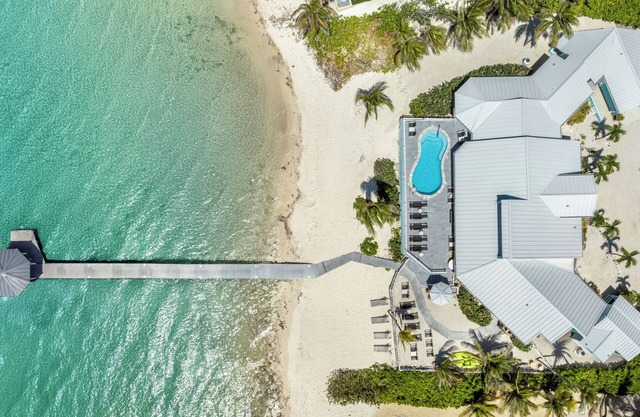 Far Tortuga: Single Level Spacious Beach Villa w/ Heated Pool and Private Dock