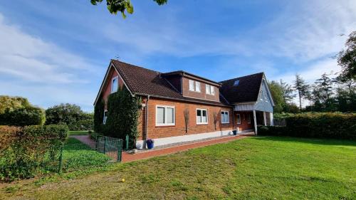 Ferienwohnung "Achtern Diek 2" 1 Reihe an der Ostseeküste