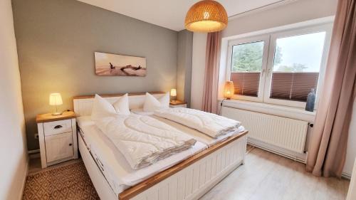 Ferienwohnung "Achtern Diek 1" 1 Reihe an der Ostseeküste