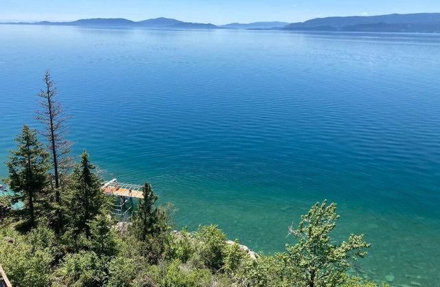 Fill your soul w/ 400' of PRIVATE waterfront w/ dock, lift, diving board & more!