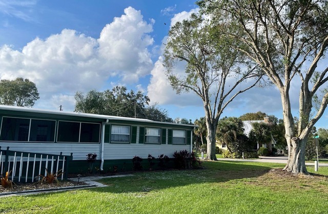 Find serenity at this family-sized Lake Okeechobee home.