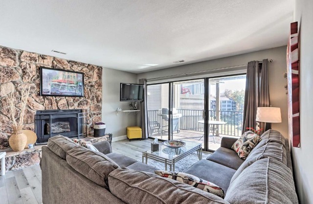 Fireplace and Grill Bright Lake Ozark Condo!