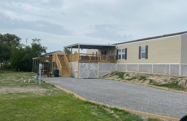 Fishing camp with water access and boat house