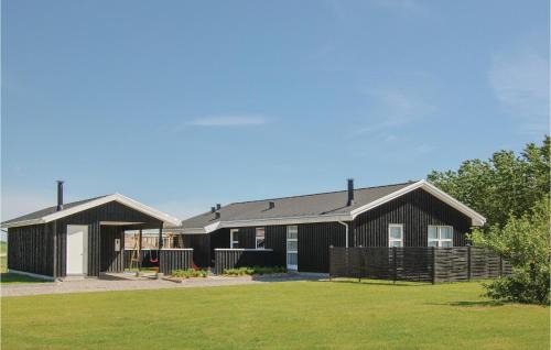 Four-Bedroom Holiday Home In Lokken
