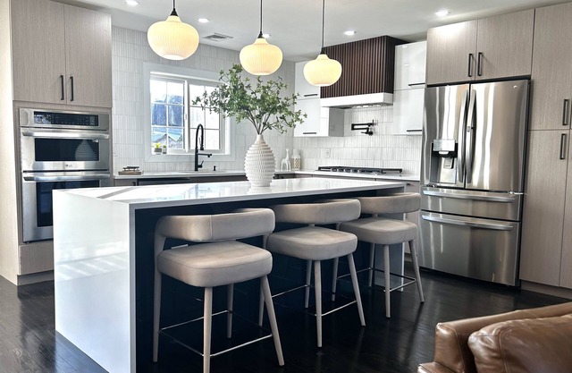 Four Levels of Family-sized Stylish Living w/ game rm, patio and large backyard