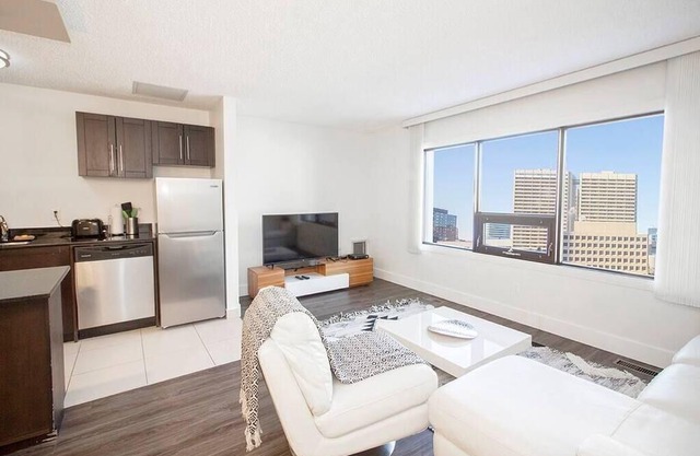 One bedroom unit with in suite laundry and parking