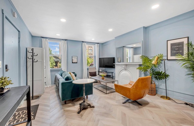French Design-Inspired West Loop Apartment with Private Balcony & Large Backyard by AllSet Turnover