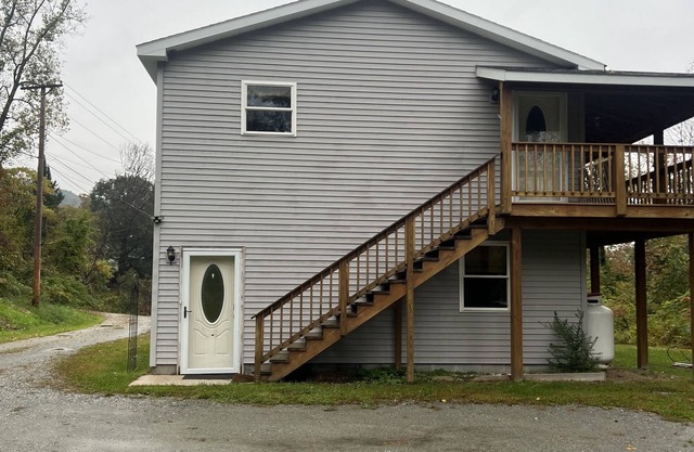 Full two story home with wrap around deck and fire pit!