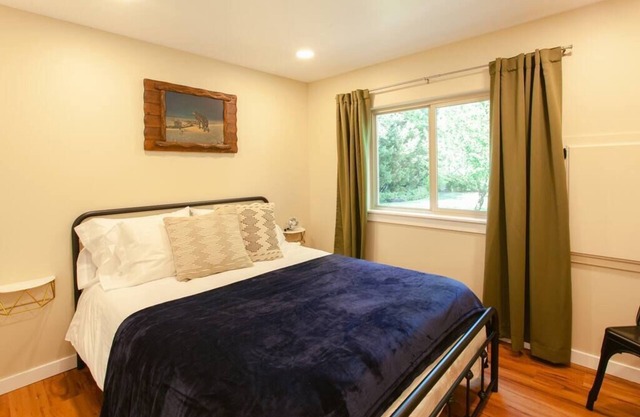 Fully equipped house on the river with a private fishing hole.