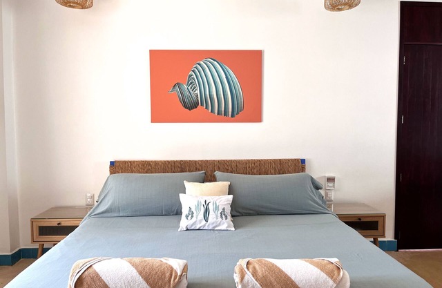Fully equipped studio with WiFi and AC steps away from the beach