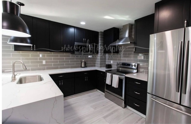 Fully furnished clean modern apartment, private covered deck, quiet wooded view.
