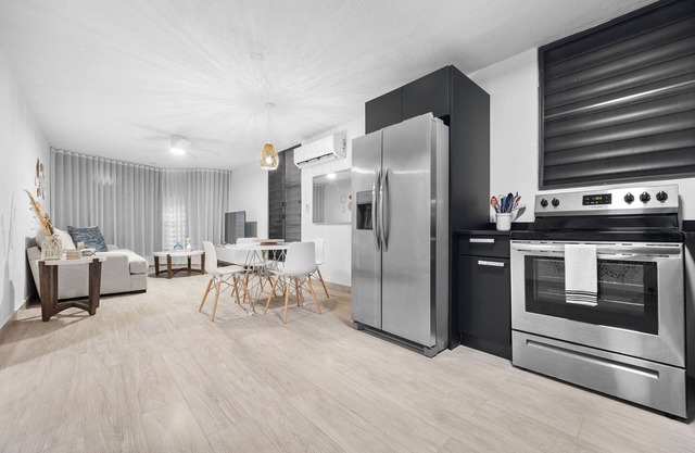 Fully Renovated Coastal Apartment Steps from the Beach with Private Parking