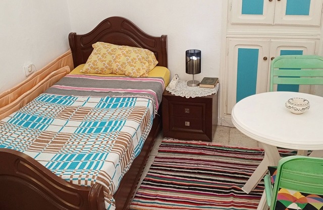 Furnished air-conditioned room with veranda