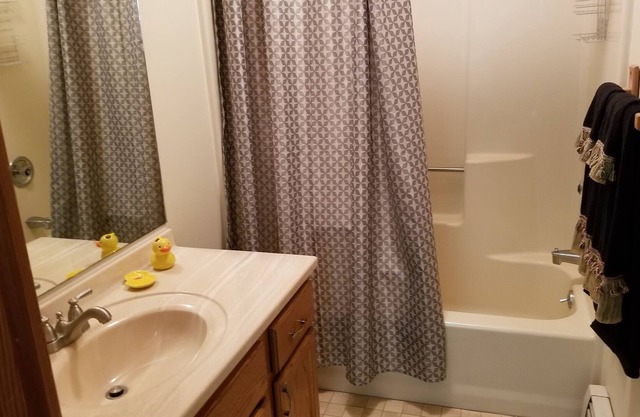 Furnished town-house with garage. 1 bedroom; 1 full bathroom and half bath