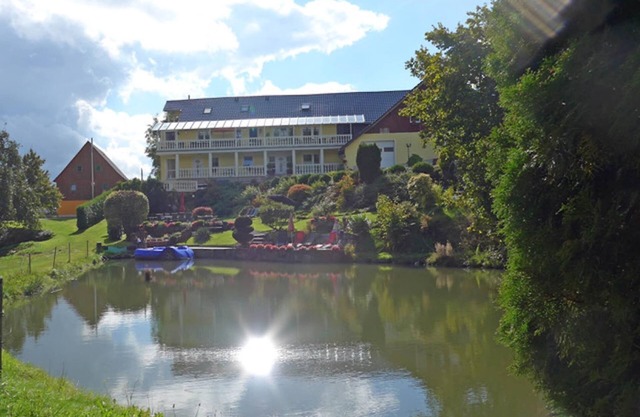Wohnung in Lichtenhain mit Teich