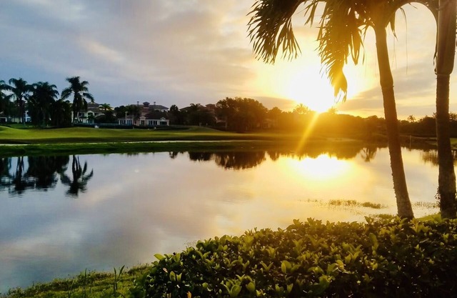 Gated Grand Harbor Townhome with beautiful views of the golf course and water