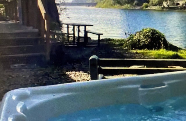 Get away on the river with fire pit and Hot Tub