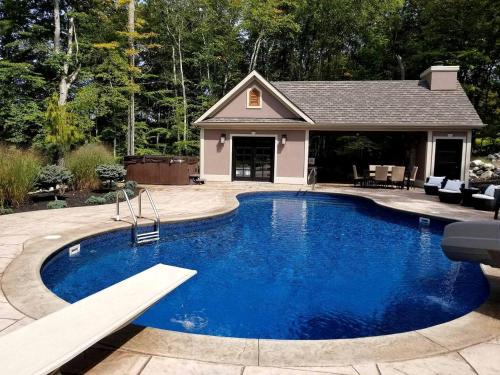 Glamorous Cottage Rental with Outdoor Lounge and Pool on 40 Acres in Pine Bush, New York