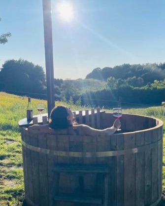 Glamping with outdoor wood-fired hot tub