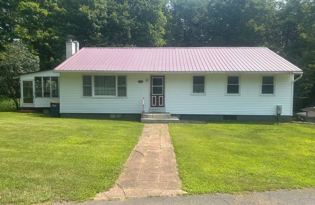 Glenmore Creek, ranch style home located on 10, mostly wooded, private acres.