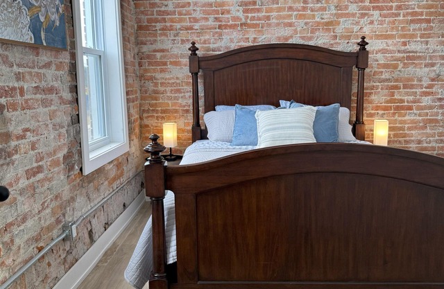 Golden Acre Suites | 3BR Downtown Loft w/Exposed Brick & Urban Charm