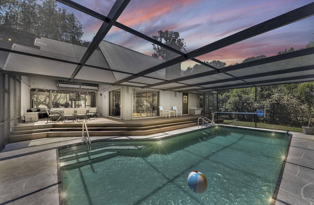Frank Lloyd Wright inspired! Lake Lotela! Heated Salt Water pool/Game Room!