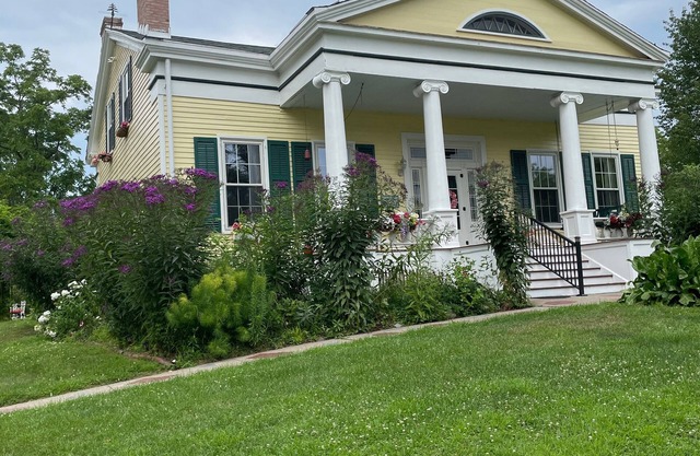 Gorgeous 1838 Greek Revival home in historic Seneca Lake with with lake access.