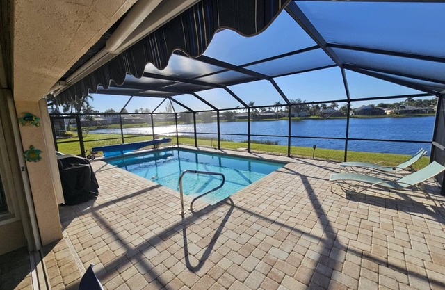Gorgeous lake view sunsets with heated, enclosed pool. Close to beaches and golf