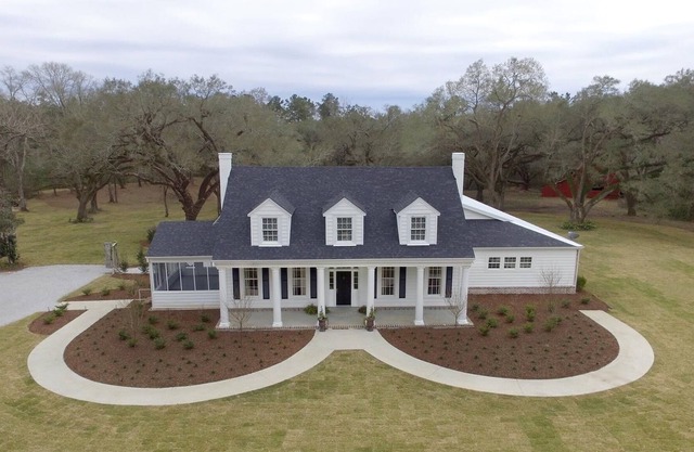 Gorgeous Stately Home with Cascading Oaks