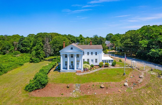 Grand home with historic charm, game room & spacious outdoor living spaces