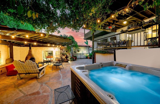 Grand Spanish Style 5BD w/ Huge 360 Rooftop Deck w/ Airport Views, AC, & Hot Tub!
