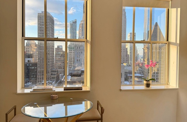 Great Condo in Luxury Wall St. Building