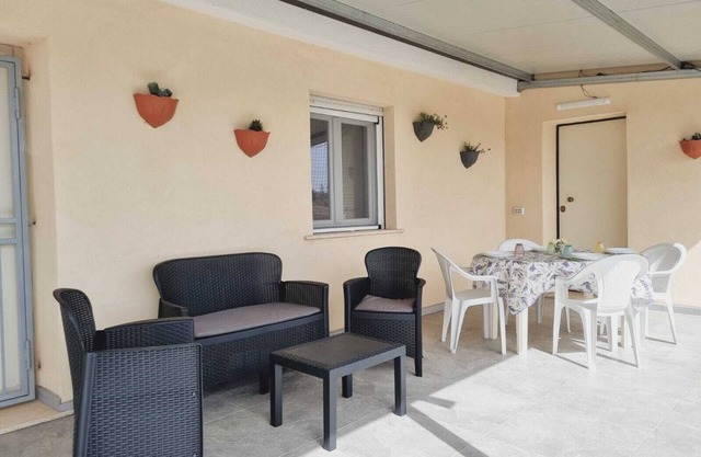 GreenHouse|Detached villa surrounded by greenery, with electric car charging