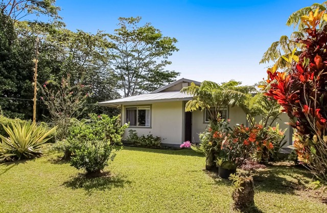 Ground-floor dog-friendly home with patio, gazebo, washer/dryer, & garden views