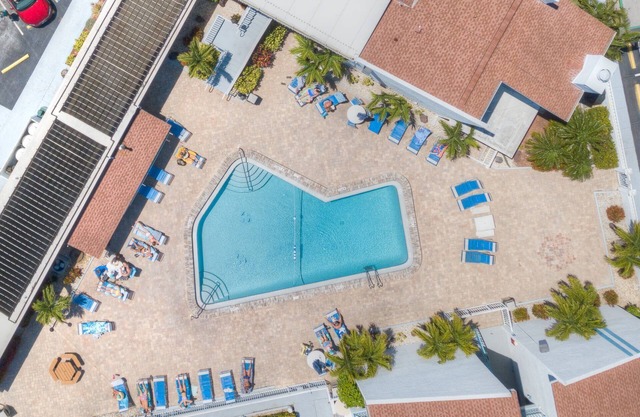 Ground-Floor Madeira Beach Condo, Pools, Marina, Walk to Sand, Shops, and Restaurants