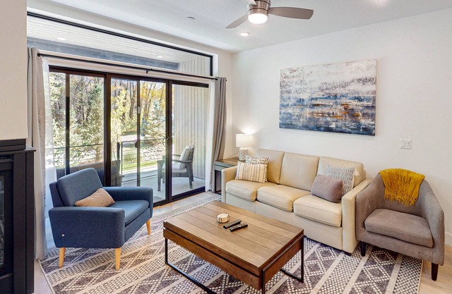 Ground-Floor, Riverfront Getaway with a Gas Fireplace, WiFi, & Furnished Patio