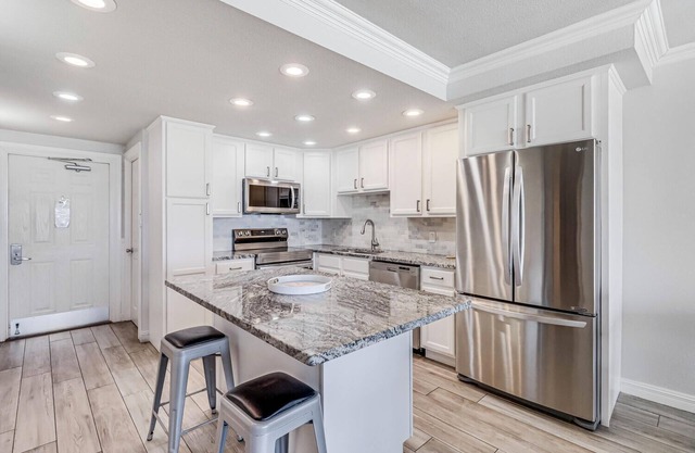 Gulfstream Condos Unit 111 | Pool & Hot Tub | Beachfront Patio