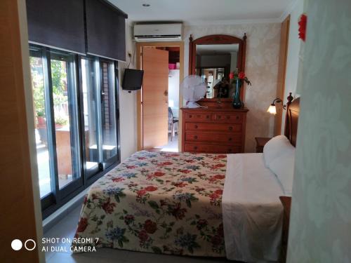Habitacion Familiar en un Ático con gran terraza y,cocina ,en la playa
