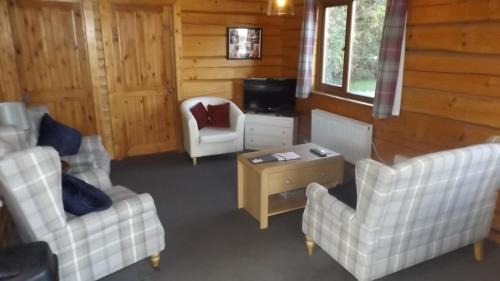 Hand built log cabin at Avonvale Holiday Lodges