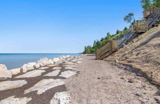 Happy Landings - Coastal home with tram and stairs to beach access!