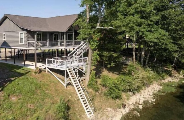 Happy Times on the Caddo Rivers Edge…. Hot tub !!