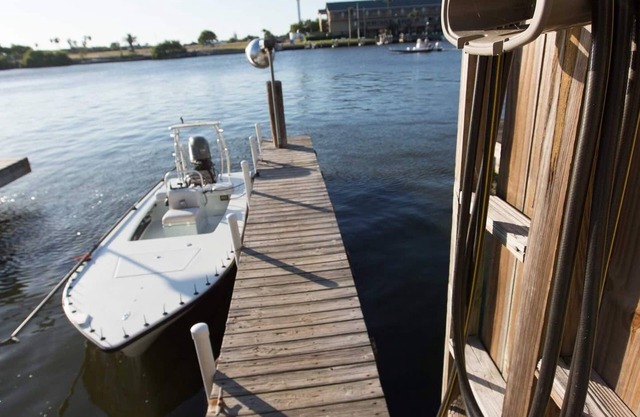 Harborfront condo with boat slip and fishing light