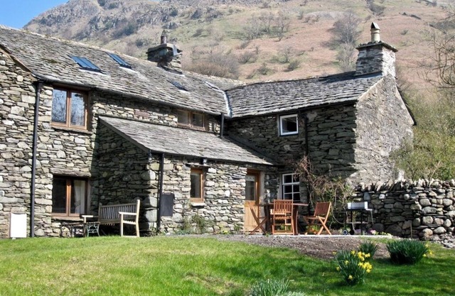 HARTSOP MILL COTTAGE, a cosy bijou hide-away surrounded by mountains
