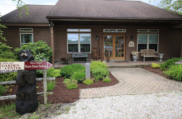 Hearts Desire is a furnished whole house in a small, colorful garden center.