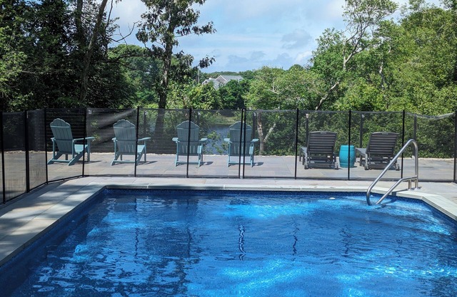 Heated saltwater pool! Walk to beach! Lakefront!